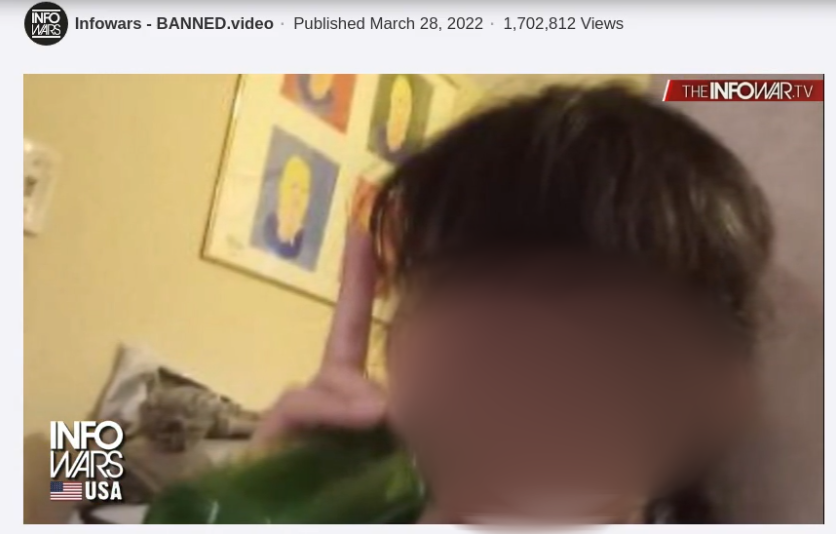 Alex Jones Show live stream screenshot, blurred by Trans Safety Network, featuring one of the fake photos of the shooter on the show. This screenshot was taken this morning at the time of writing